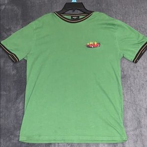 Green forever 21 racecar stitched shirt.